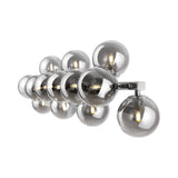 The Dallas 13 Light Wall Light features a chrome design with overlapping smoked mirrored glass spheres in a horizontal pattern, each housing a visible bulb for a modern, reflective appeal.