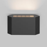 The Pull Outdoor LED Wall Light 5W 3000K in graphite features a modern rectangular design with a front grid pattern, emitting a soft white glow upwards, and offers an IP54 protection rating.