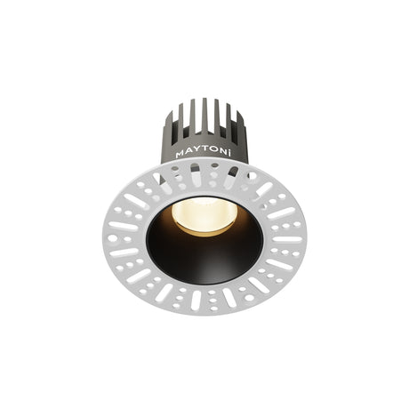Maytoni Dip 10W 3000K LED recessed downlight with black aluminium body, black baffle and white perforated trim ring on a plain background.