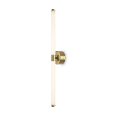 The Axis LED Wall Light 16W 3000K - Gold has a minimalist design with a long, cylindrical white fixture mounted on a gold-finished brass circular base, enhanced by brass accents at both ends.