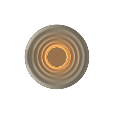 Maytoni Nami Wood LED wall light in khaki, circular sconce with concentric rings radiating from a central warm-lit aperture, on a white background.