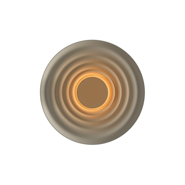 Maytoni Nami Wood LED wall light in khaki, circular sconce with concentric rings radiating from a central warm-lit aperture, on a white background.
