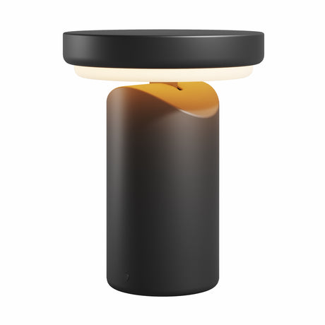 Maytoni Topo Disc rechargeable LED table lamp in matt black metal with cylindrical body, amber accent ring and frosted diffuser disc, on white.