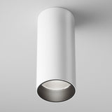 The Focus LED Dimmable Fixed Round Surface Mounted Downlight 12W 4000K in white offers a modern, cylindrical design with an open bottom showcasing the LED downlight. Ideal for energy-efficient lighting, it features a clean, minimalist style against a white background.