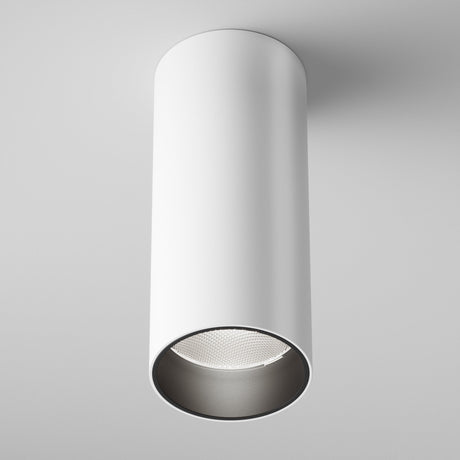 The Focus LED Dimmable Fixed Round Surface Mounted Downlight 12W 4000K in white offers a modern, cylindrical design with an open bottom showcasing the LED downlight. Ideal for energy-efficient lighting, it features a clean, minimalist style against a white background.