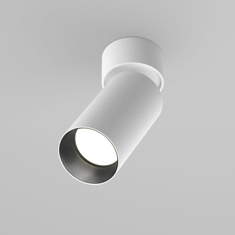 The Artisan Single Spotlight - White, with a textured finish, offers premium downward illumination for modern interiors from its ceiling-mounted cylindrical design.