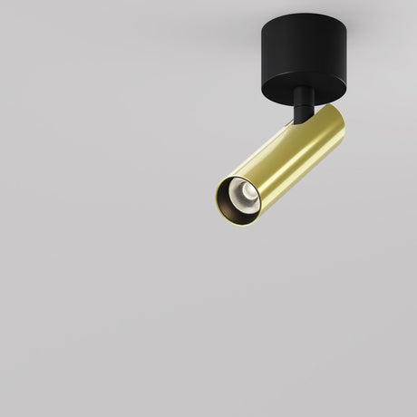 The Focus T LED Short Single Spotlight 6W 3000K in Black & Brass features a sleek gold cylinder and black base, making it an energy-efficient standout against a plain white background.