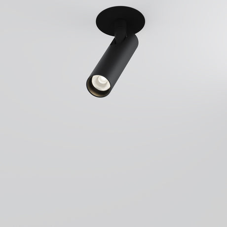 The Focus T LED Adjustable Short Recessed Downlight 6W 3000K in black is a sleek, cylindrical ceiling fixture on a white surface. It offers an LED downlight angled slightly downward, ideal for energy-efficient spotlighting in modern interiors with its minimalist design.
