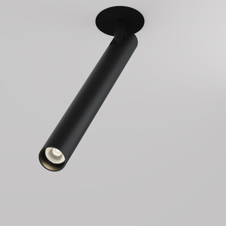 The Focus T LED Adjustable Long Recessed Downlight 6W 3000K - Black is a sleek black cylindrical ceiling fixture ideal for modern interiors, mounted on a white ceiling and featuring LED capabilities for casting adjustable focused lighting downward.