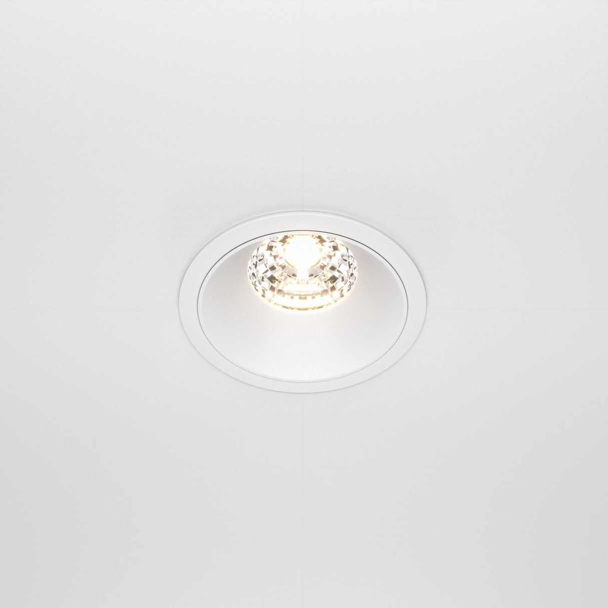 The Alfa LED Dimmable Fixed Round Recessed Downlight features a 15W, 3000K circular LED fixture. Its white ceiling mount enhances the soft glow, offering high CRI dimmable lighting for perfect ambiance.