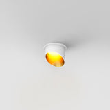 The Lipari Fixed Recessed Downlight - White & Gold offers a modern design with a white exterior and glowing gold interior, delivering warm, focused lighting. Its minimalist elegance allows it to blend seamlessly into the ceiling for a refined aesthetic.
