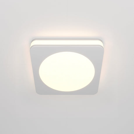 The Phanton LED Recessed Downlight 7W 3000K - White is a square ceiling light fixture with rounded corners, featuring a bright circular center. It uses energy-efficient LED technology and is mounted on a pale ceiling.