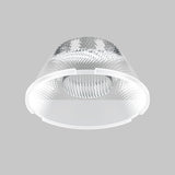 The Wise Downlight Lens (⌀29mm, 15°) is a modern, transparent conical lampshade with a textured surface and embossed geometric designs. Made of glass or acrylic, it provides focused lighting with a 15° beam angle against a simple gray background, enhancing its sleek aesthetic.