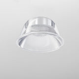 The Focus LED Track Light Lens ⌀55mm 50° is a modern, silver recessed ceiling light with a textured, reflective surface and ambient lighting. It features a smooth edge, circular design, and offers a sophisticated 50° beam angle for enhanced illumination against a plain gray background.
