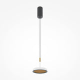 The El LED Round Tablet Pendant Light is a modern interiors marvel, featuring a black cylindrical ceiling mount, slender cable, and a white lamp with a gold interior. Its sleek, minimalistic design provides ambient lighting for any space.