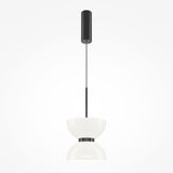 The Kyoto LED Pendant Light - Black With Glossy White Glass is a minimalist masterpiece featuring a sleek black cylindrical ceiling mount, central rod, and two outward-facing white bowl-shaped shades. Its energy-efficient LED lighting adds modern elegance.