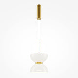 The Kyoto LED Pendant Light combines a glossy white bowl-shaped shade with a golden rod and fixture, featuring symmetric curves and minimalist design. It hangs from a black wire attached to a cylindrical gold mount, perfect for modern interiors needing energy-efficient lighting.