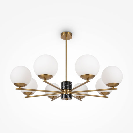 A contemporary chandelier with a central black rod and six brass arms, featuring opal glass shades. This elegant fixture, suspended from the ceiling, evokes the modern design of the Marble 8 Light Chandelier - Brass.