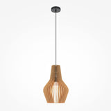 The Roots Pendant Light from the modern nature collection features a 30cm sculptural black-and-beige wooden cone dome shade. Vertical slats contribute to its elegant, curved design as it gracefully hangs from the ceiling.