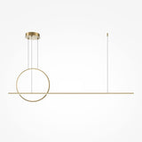 The Halo Dimmable LED Linear Circle Suspension Light 2600-3500K in Brass blends minimalist elegance with modern geometry. Featuring a brass circle and horizontal bar, it hangs gracefully by slim wires, making it a stylish centerpiece against any white backdrop.