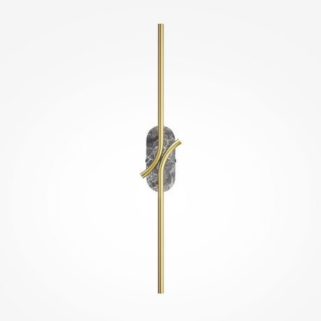 The Renaissance LED Wall Light combines a vertical brass rod and curved accents intersecting a textured grey marble circle, all set against a plain light gray background.