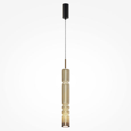 The Ordo LED Long Pendant Light features a gold vertically ribbed design with a cognac cylindrical glass shade and black ceiling mount, showcasing an elegant ridged structure that houses an energy-efficient LED light for a contemporary look.