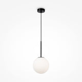 The Basic Form Globe Pendant Light 20cm in Black, with frosted white glass, features a sleek metal frame and hangs elegantly from the ceiling, casting a soft ambient glow. Its minimalist and contemporary design suits any stylish space.