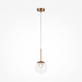 The Basic Form Globe Pendant Light 15cm elegantly hangs with a gold finish and a frosted and clear glass globe shade, featuring a minimalist spherical bulb within, all set against a plain white background.