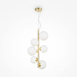 The Dallas 6 Light Drop Suspension features a modern chandelier design with a gold frame and six white glass spheres, arranged vertically in a sleek, minimalist style.