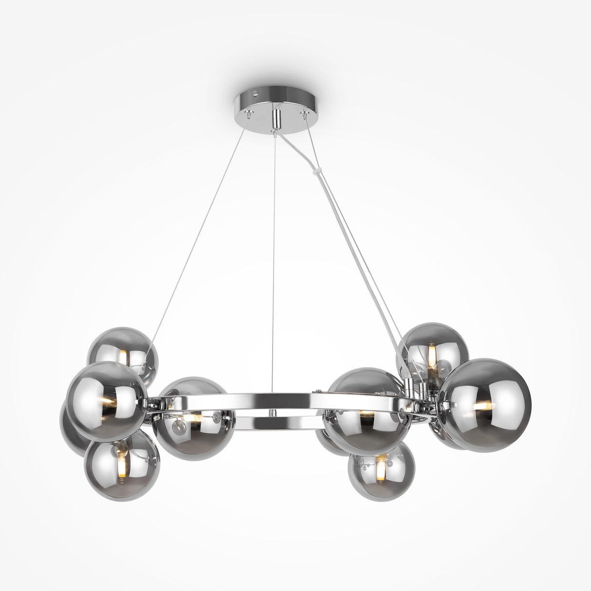 The Dallas 11 Light Suspension features a circular metallic frame with multiple spherical chrome lights and smoked glass, suspended from thin wires. This sleek, contemporary chandelier enhances any space against a plain white background.