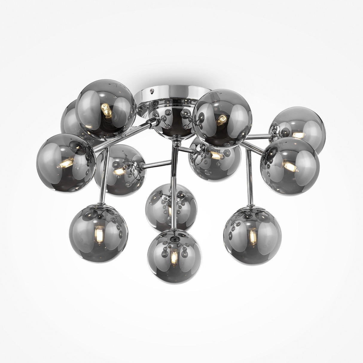 The Dallas 12 Light Semi-Flush features a modern chrome base with a cluster of spherical smoky glass bulbs, each showcasing a visible filament for an elegant contemporary design.