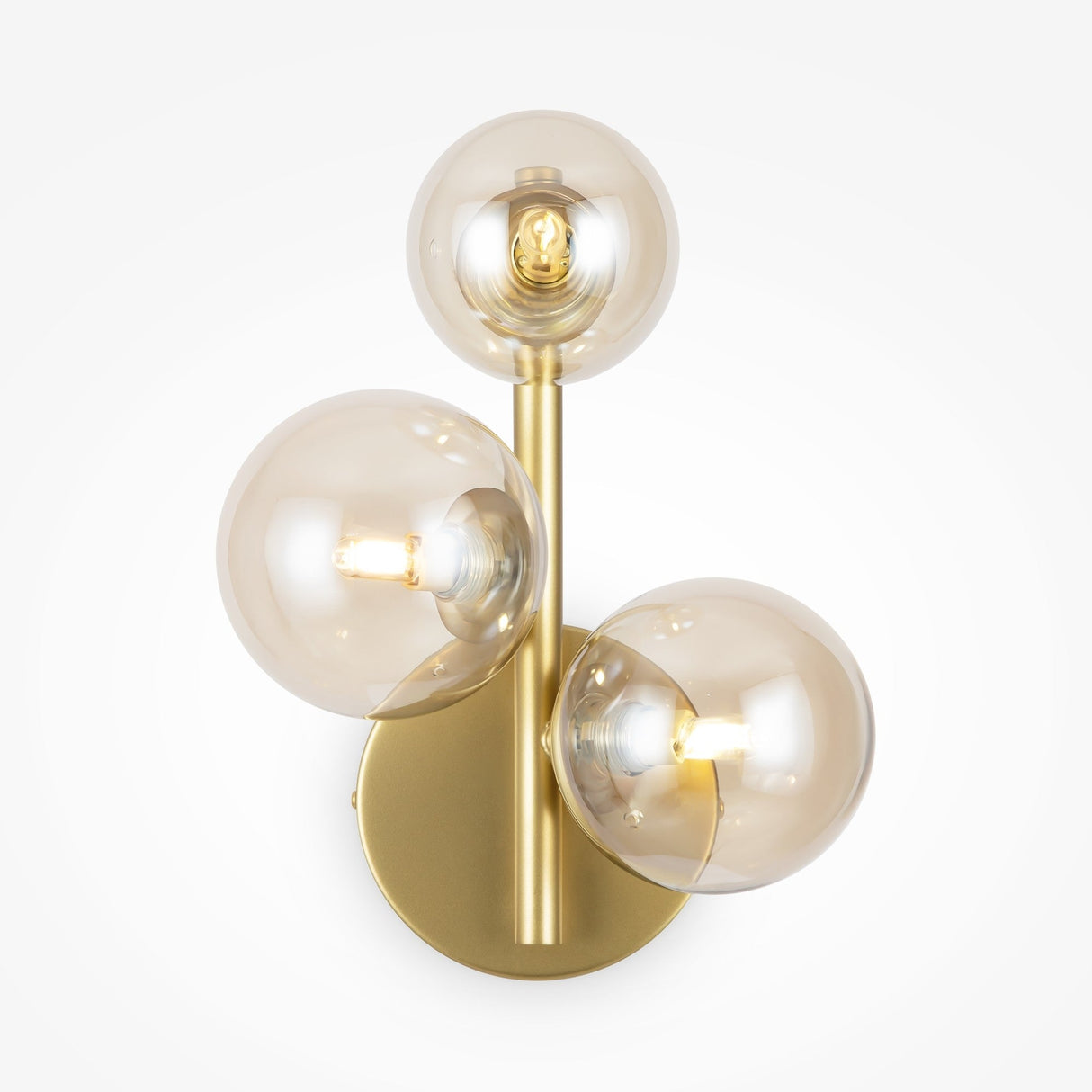 The Dallas 3 Light Wall Light - Gold With Amber Mirrored Glass boasts a modern gold metal base and three spherical warm-tinted glass bulbs. Its minimalist design and elegant amber mirrored glass bring sophistication to any room.