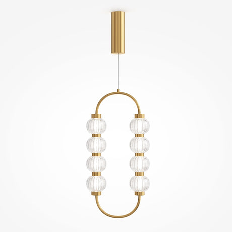The Amulet LED Pendant features an oval gold frame with eight ribbed glass spheres, suspended from a short gold rod attached to the ceiling.