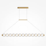 The Amulet LED Linear Suspension Light features 12 ribbed glass spheres in a linear arrangement. Suspended by two thin wires from a brass ceiling mount and bar, its adjustable suspension adds versatility to this minimalist design.