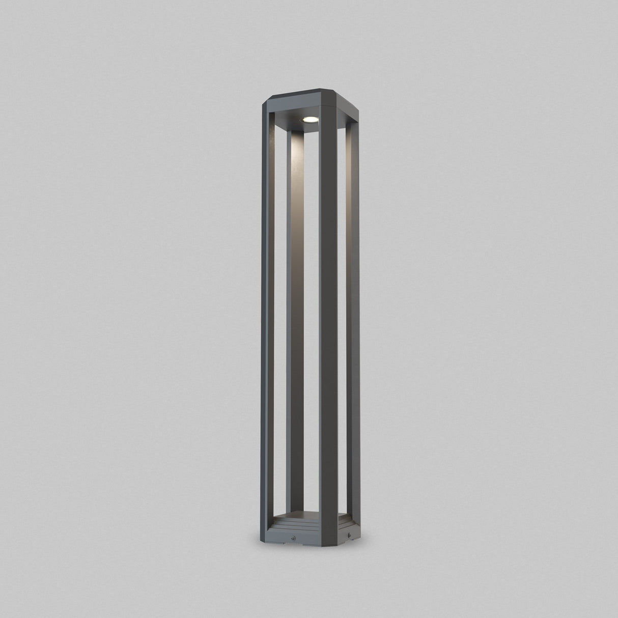 The Royal Mile LED Long Rectangular Pedestal Light in grey boasts a minimalist open-frame design and LED technology. Its modern, black structure directs light downward and is perfect for outdoor illumination with IP65 protection.