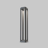 The Royal Mile LED Long Rectangular Pedestal Light in grey boasts a minimalist open-frame design and LED technology. Its modern, black structure directs light downward and is perfect for outdoor illumination with IP65 protection.