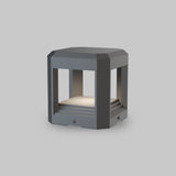 The Royal Mile LED Square Pedestal Light - Grey is a modern outdoor lamp with a die-cast aluminum body and matte gray finish. It features an open rectangular frame that emits a soft white glow, offering IP65 protection for durability.
