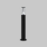 The Bronx Bollard Light 796mm in black, designed with corrosion-resistant aluminum, has a sleek cylindrical body and a clear top section accented with metal on a gray background, showcasing modern outdoor lighting aesthetics.