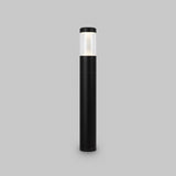 The Koln LED Bollard Light 65cm - Black is a tall, black cylindrical outdoor fixture with a transparent top section and an efficient LED module, casting a warm glow against a plain gray background.