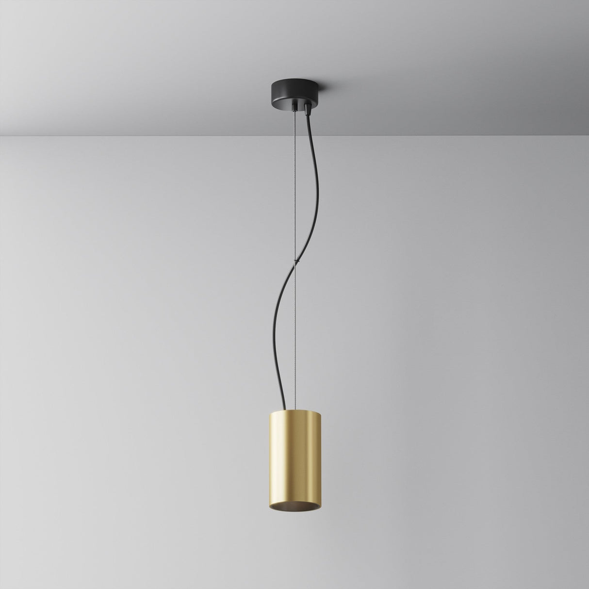 The Efir LED Pendant Light 15W features a modern design with a cylindrical matte gold shade and black cord. Its mounted on a light gray ceiling, creating a minimalist and sophisticated ambiance that embodies modern elegance.