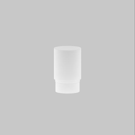 A white cylindrical container, likely for cosmetics or toiletries, is centered on a light gray background, illuminated by the softening effect of the Focus LED Light Diffuser Medium 5W.