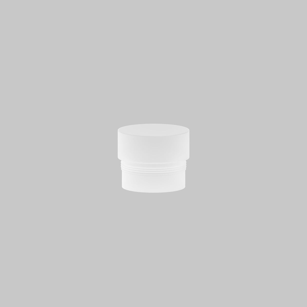 A Focus LED Light Diffuser Small 12W, with a screw-on lid, sits centered against a light gray background, resembling a minimalist small white plastic jar.