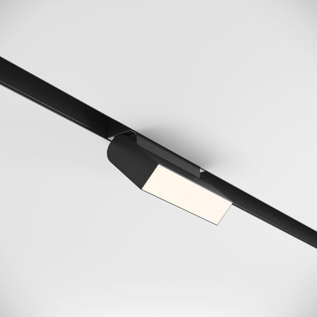 The Basis Rot LED Adjustable Linear Track Light, designed for the Magnetic S35 system, features a minimalist black rectangular panel with energy-efficient 10W 4000K LED technology, ideal for white ceiling installations.