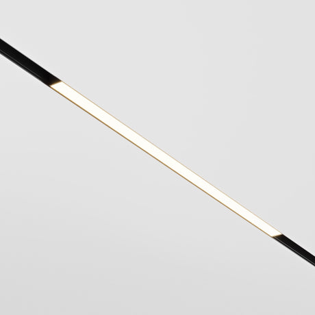 The Basis CCT LED Dimmable Linear Track Light for Magnetic Exility 24W 2700-6000K - Black is embedded in a ceiling, offering sleek and minimalist design. It emits a warm glow against a white background, with customizable lighting via Bluetooth Mesh for the perfect ambiance.