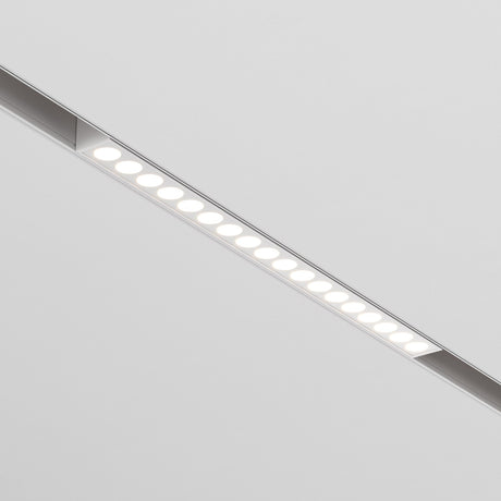 The Points LED Linear Track Light for Magnetic Exility 18W 3000K in white delivers a sleek, even glow on plain ceilings, perfect for accent lighting.