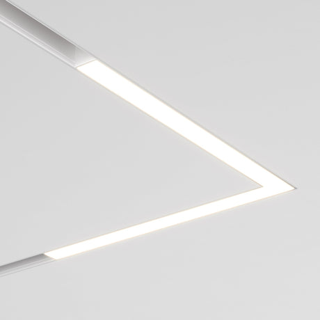 A minimalist ceiling design highlights the modern Basis Angle LED Corner Linear Track Light for Magnetic Exility 24W 4000K - White. It forms an angular shape against a plain white ceiling, casting a soft glow and adding a sleek architectural element.