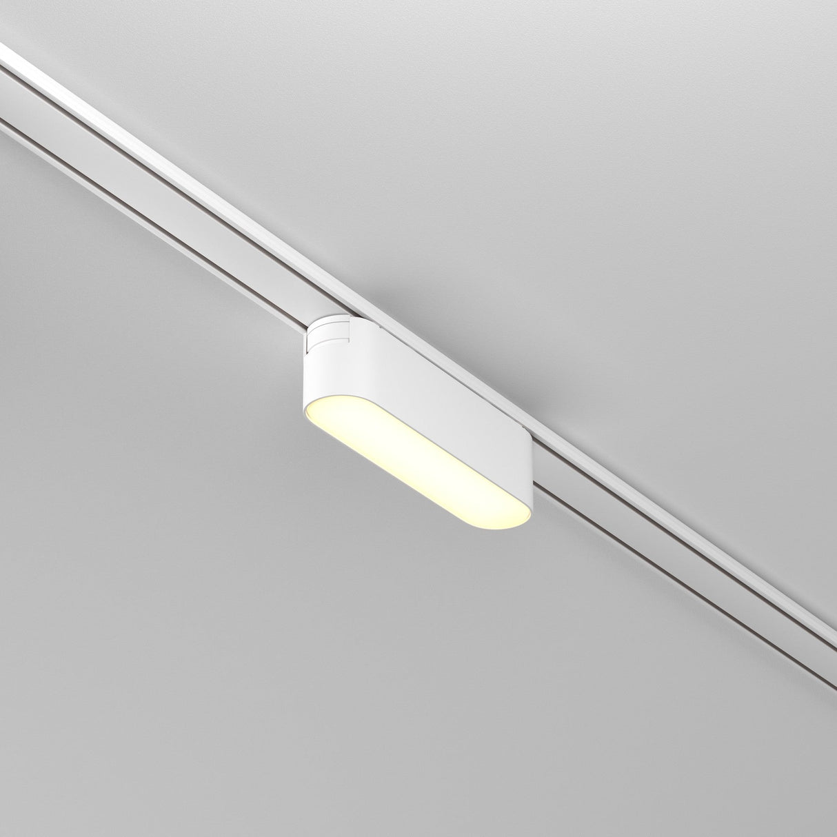 The Basis LED Linear Track Light for Magnetic Tracks Radity 6W 3000K in white offers a sleek, modern design with a soft, warm glow. It blends seamlessly with the ceiling and effectively illuminates spaces, making it ideal for contemporary interiors.