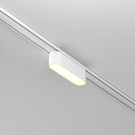 The Basis LED Linear Track Light for Magnetic Tracks Radity 6W 3000K in white offers a sleek, modern design with a soft, warm glow. It blends seamlessly with the ceiling and effectively illuminates spaces, making it ideal for contemporary interiors.