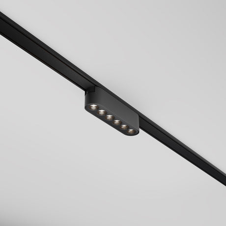 The Points LED Linear Track Light for Magnetic Tracks Radity 6W 4000K - Black includes six round LED bulbs on a rectangular fixture, mounted on a magnetic track against a white ceiling.