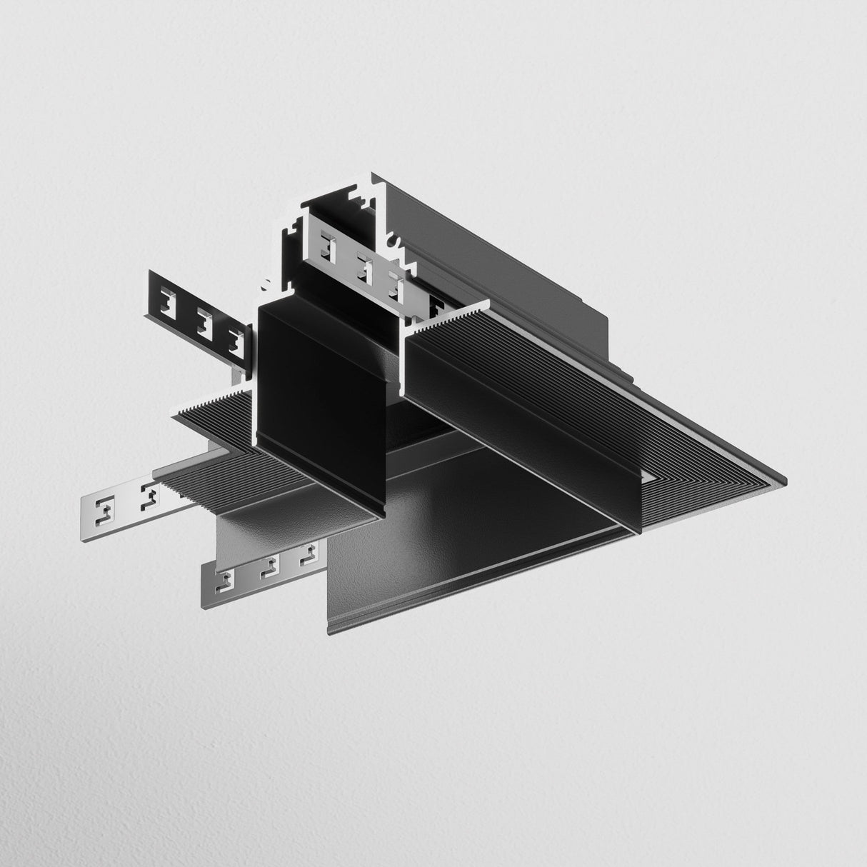 The S35 Tracks Recessed L-Shape Corner Connector in black, boasting a metallic architectural design with interlocking sections and grooves, is suspended against a light gray background. Its industrial and geometric form is perfect for modern interiors.